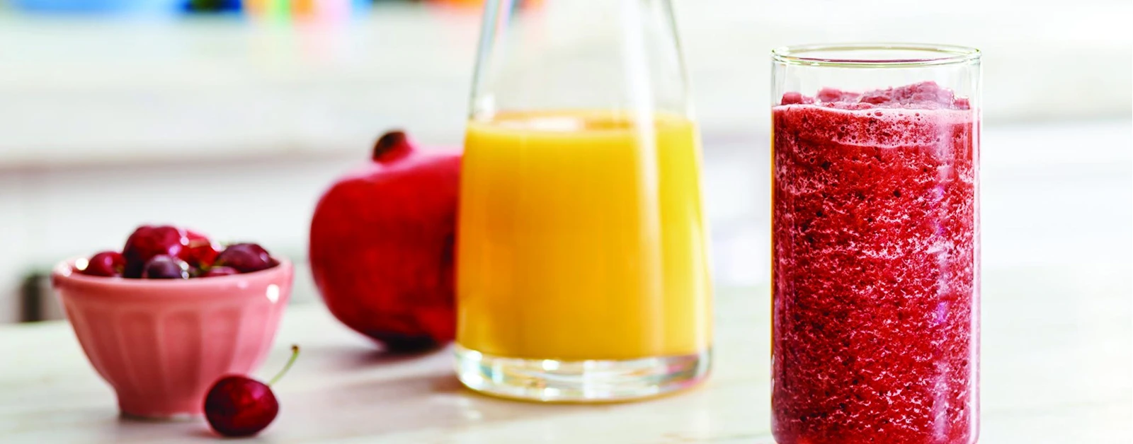 immune system boosting super fruit smoothie recipe with orange juice, pomegranate juice and dark cherries