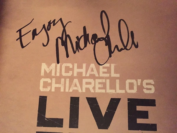 autographed signed used copy of Michael Chiarellos cookbook Live Fire